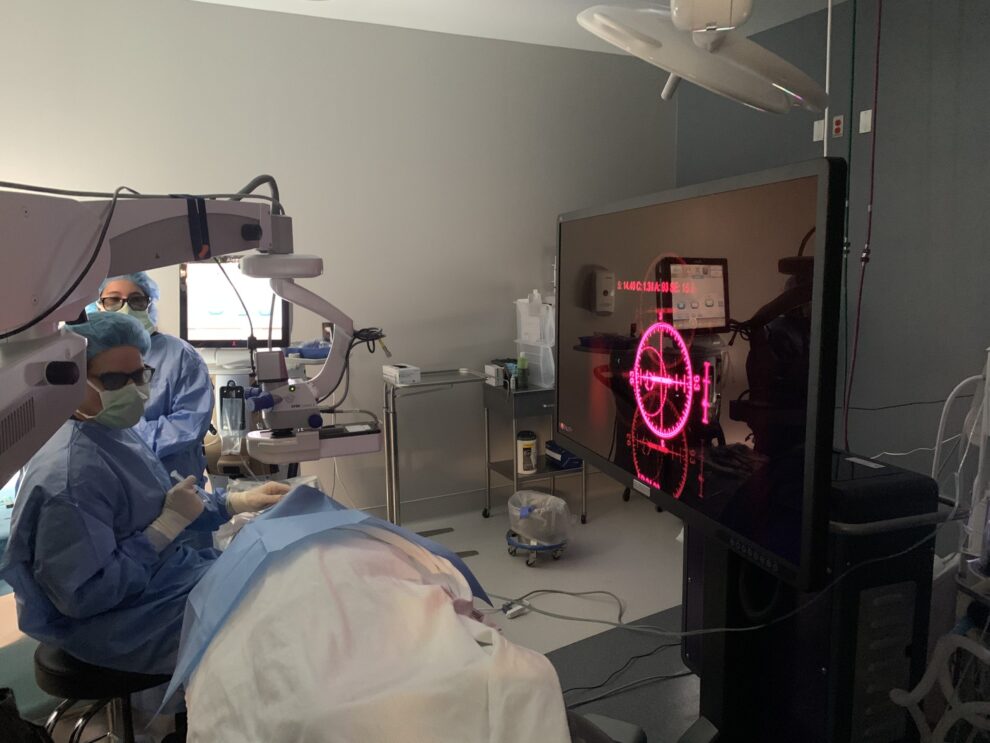 Dr. Robert Schultze preforming eye surgery