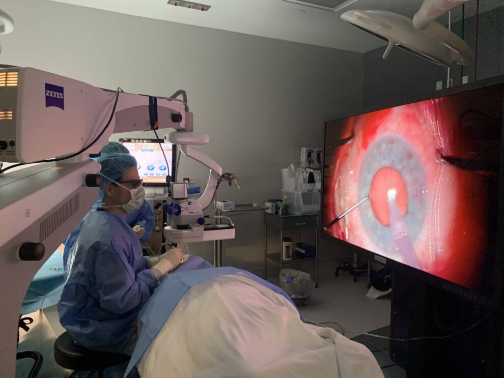 Dr. Robert Schultze preforming eye surgery