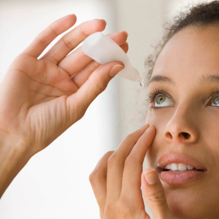 Dry Eye Syndrome woman using eye drops