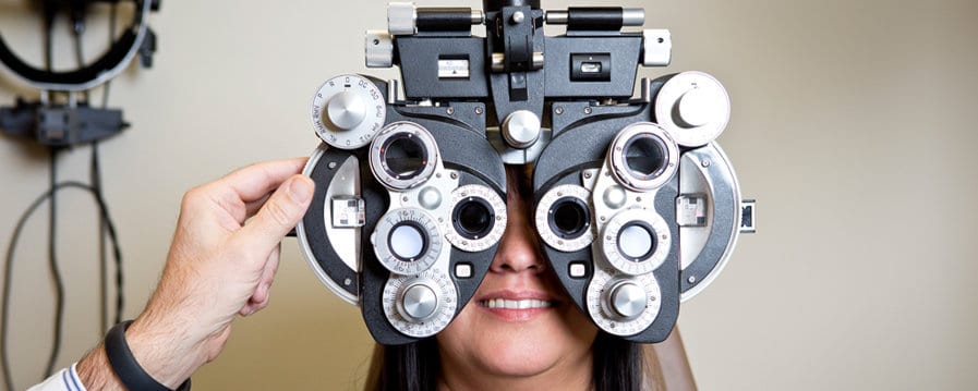 Woman having her eyes examined